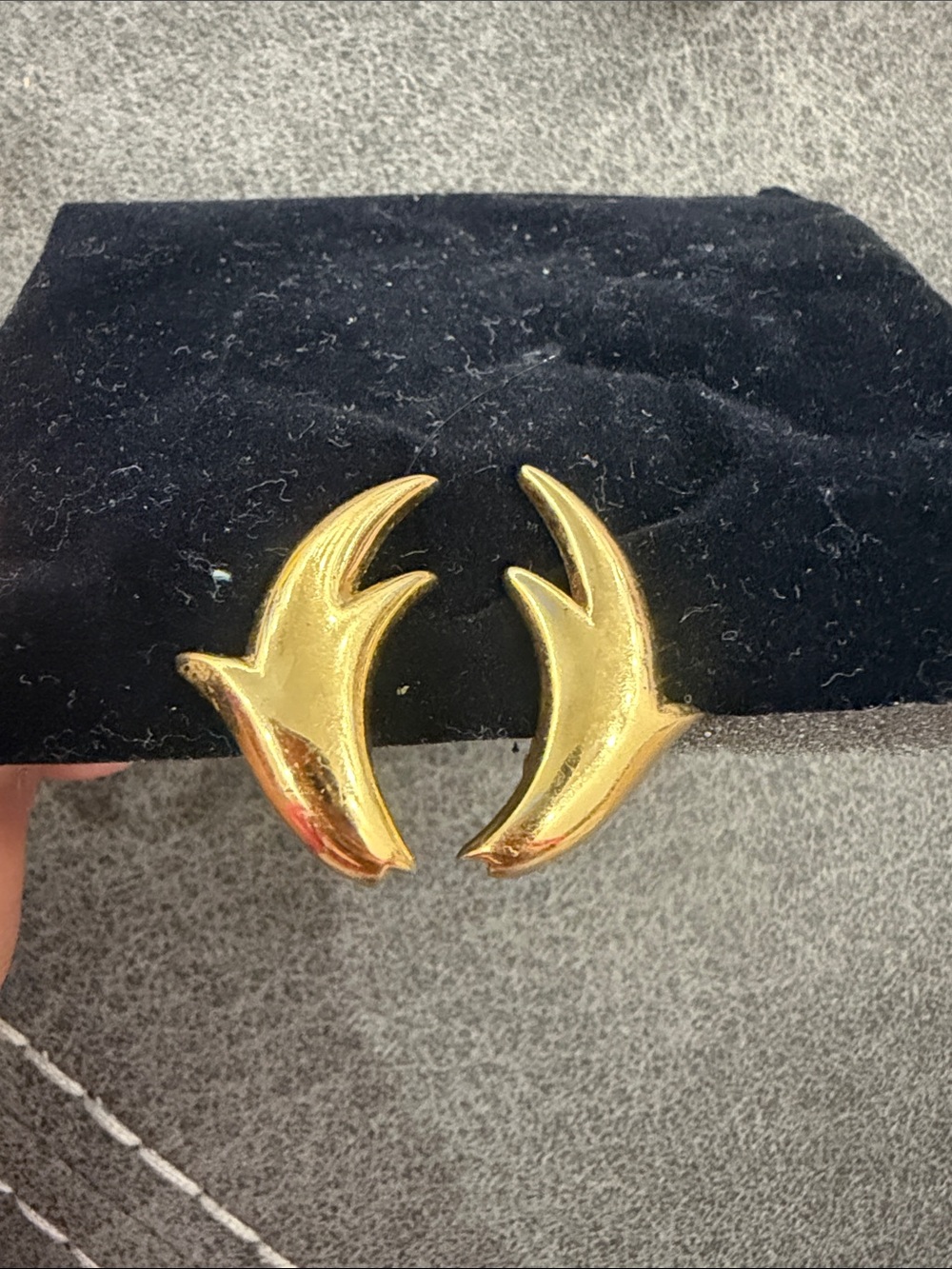 Vintage signed Monet gold-tone costume jewelry earrings.